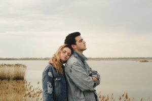 couple standing close together embracing one another