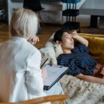 young-woman-lying-on-the-couch-at-a-therapy-session